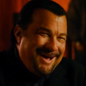 Steven Seagal is bad at laughing but loves his guns